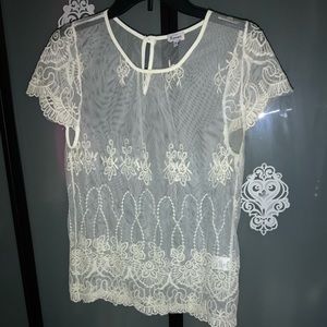 Cute White see through top with lace accent